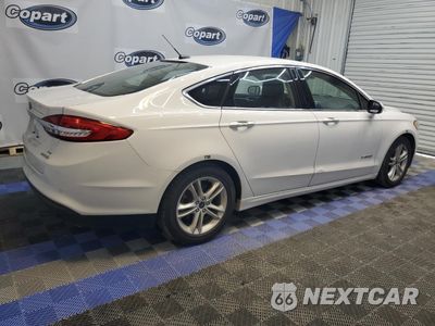 Trzecie zdjęcie samochodu z tyłu: 2018 FORD FUSION SE HYBRID VIN:3FA6P0LU6JR163506 - miniatura