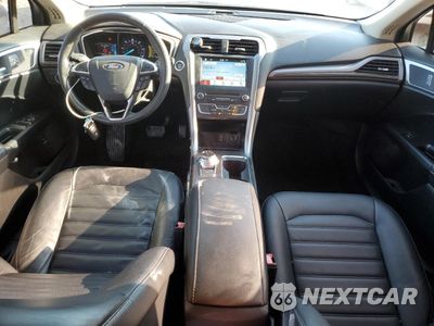 Zdjęcie 8 z 12 samochodu: 2018 FORD FUSION SE HYBRID VIN:3FA6P0LU0JR278750 - miniatura