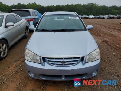 Piąte zdjęcie samochodu w środku: 2005 KIA SPECTRA LX VIN:KNAFE121365236917 - miniatura