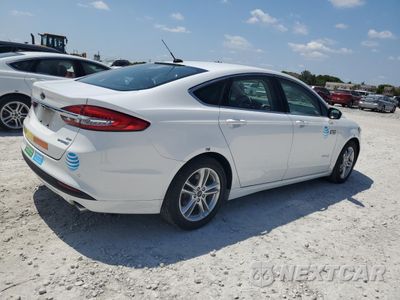 Trzecie zdjęcie samochodu z tyłu: 2018 FORD FUSION SE HYBRID VIN:3FA6P0LU3JR172003 - miniatura