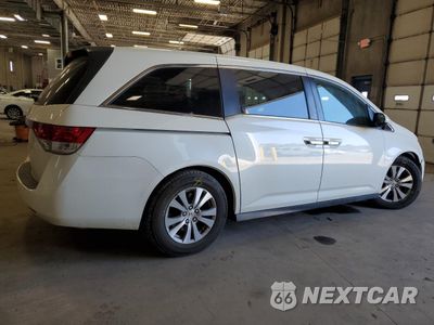 Trzecie zdjęcie samochodu z tyłu: 2016 HONDA ODYSSEY EXL VIN:5FNRL5H67GB014753 - miniatura