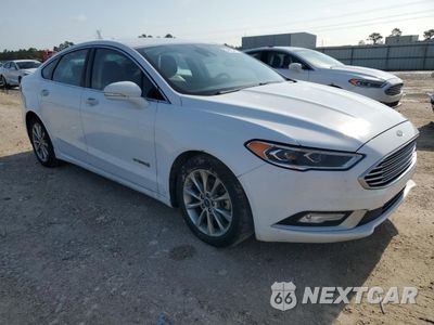 Czwarte zdjęcie samochodu z boku: 2017 FORD FUSION SE HYBRID VIN:3FA6P0LUXHR410150 - miniatura
