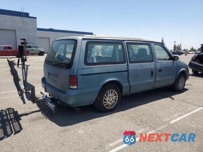 Trzecie zdjęcie samochodu z tyłu: 1994 DODGE GRAND CARAVAN SE VIN:1B4GH44RXRX199034 - miniatura