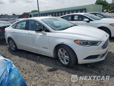 Czwarte zdjęcie samochodu z boku: 2018 FORD FUSION SE HYBRID VIN:3FA6P0LU0JR172024 - miniatura