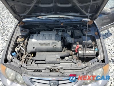 Zdjęcie 11 z 12 samochodu: 2003 KIA SPECTRA GS VIN:KNAFB161535127907 - miniatura