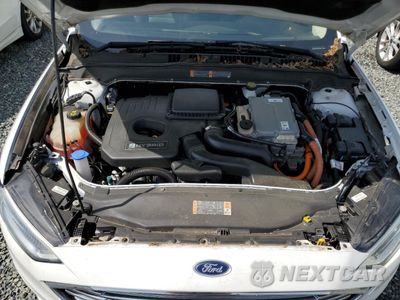 Zdjęcie 11 z 12 samochodu: 2017 FORD FUSION SE HYBRID VIN:3FA6P0LU3HR359591 - miniatura
