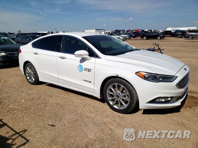 Czwarte zdjęcie samochodu z boku: 2017 FORD FUSION SE HYBRID VIN:3FA6P0LU2HR409381 - miniatura
