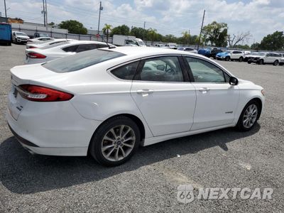 Trzecie zdjęcie samochodu z tyłu: 2017 FORD FUSION SE HYBRID VIN:3FA6P0LU4HR409642 - miniatura