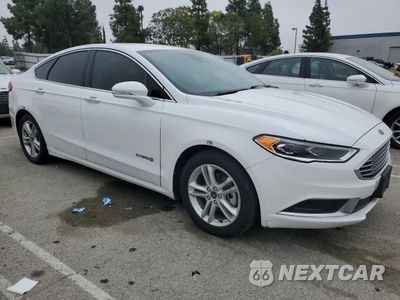 Czwarte zdjęcie samochodu z boku: 2018 FORD FUSION SE HYBRID VIN:3FA6P0LU9JR172149 - miniatura