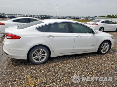 Trzecie zdjęcie samochodu z tyłu: 2018 FORD FUSION SE HYBRID VIN:3FA6P0LU0JR171682 - miniatura