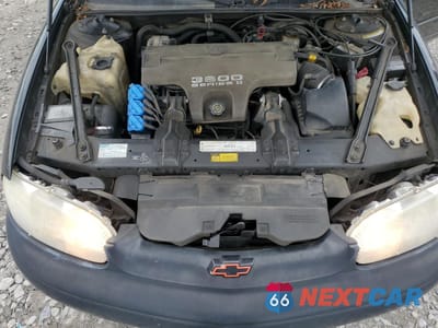 Zdjęcie 11 z 14 samochodu: 1999 CHEVROLET MONTE CARLO Z34 VIN:2G1WX12K2X9197580 - miniatura