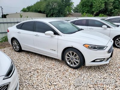 Czwarte zdjęcie samochodu z boku: 2017 FORD FUSION SE HYBRID VIN:3FA6P0LUXHR409550 - miniatura
