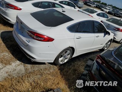 Trzecie zdjęcie samochodu z tyłu: 2018 FORD FUSION SE HYBRID VIN:3FA6P0LU7JR171596 - miniatura