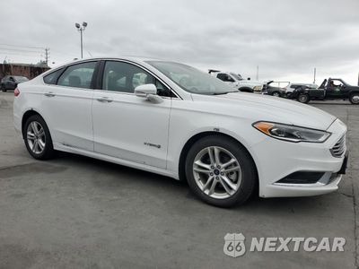 Czwarte zdjęcie samochodu z boku: 2018 FORD FUSION SE HYBRID VIN:3FA6P0LU4JR178473 - miniatura