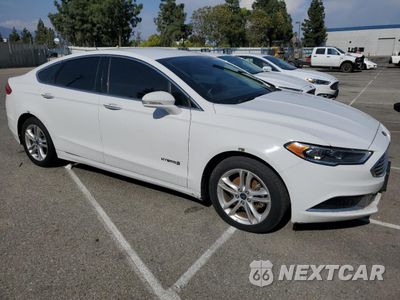 Czwarte zdjęcie samochodu z boku: 2018 FORD FUSION SE HYBRID VIN:3FA6P0LU8JR281878 - miniatura