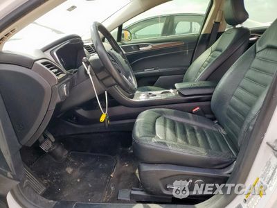 Zdjęcie 7 z 12 samochodu: 2017 FORD FUSION SE HYBRID VIN:3FA6P0LUXHR409001 - miniatura