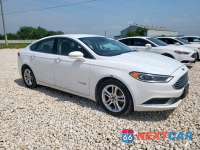 Czwarte zdjęcie samochodu z boku: 2018 FORD FUSION SE HYBRID VIN:3FA6P0LUXJR171575 - miniatura