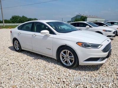 Czwarte zdjęcie samochodu z boku: 2018 FORD FUSION SE HYBRID VIN:3FA6P0LUXJR171575 - miniatura