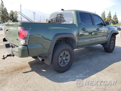 Trzecie zdjęcie samochodu z tyłu: 2021 TOYOTA TACOMA DOUBLE CAB VIN:5TFAZ5CN6MX101460 - miniatura