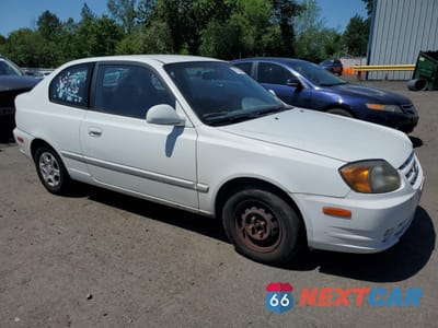 Czwarte zdjęcie samochodu z boku: 2005 HYUNDAI ACCENT GS VIN:KMHCG35C75U353506 - miniatura