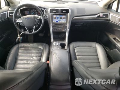 Zdjęcie 8 z 12 samochodu: 2017 FORD FUSION SE HYBRID VIN:3FA6P0LU3HR409535 - miniatura