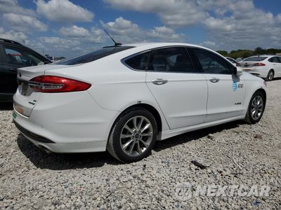 Trzecie zdjęcie samochodu z tyłu: 2017 FORD FUSION SE HYBRID VIN:3FA6P0LU3HR409471 - miniatura