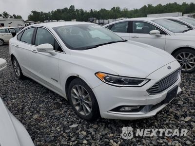Trzecie zdjęcie samochodu z tyłu: 2017 FORD FUSION SE HYBRID VIN:3FA6P0LU1HR409274 - miniatura