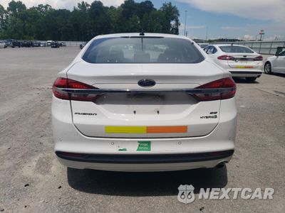 Zdjęcie 6 z 12 samochodu: 2018 FORD FUSION SE HYBRID VIN:3FA6P0LUXJR171723 - miniatura