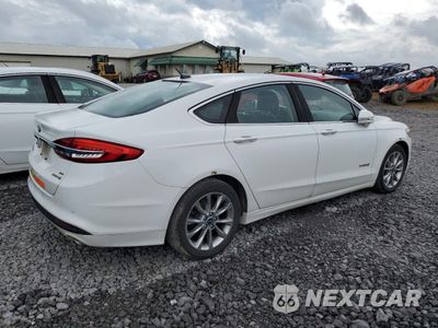 Trzecie zdjęcie samochodu z tyłu: 2017 FORD FUSION SE HYBRID VIN:3FA6P0LU2HR409221 - miniatura