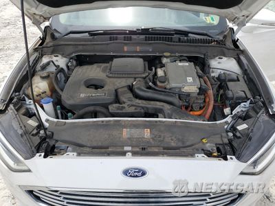 Zdjęcie 11 z 12 samochodu: 2017 FORD FUSION SE HYBRID VIN:3FA6P0LU9HR359689 - miniatura