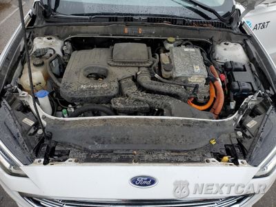 Zdjęcie 11 z 13 samochodu: 2017 FORD FUSION SE HYBRID VIN:3FA6P0LUXHR409144 - miniatura