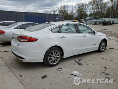 Trzecie zdjęcie samochodu z tyłu: 2018 FORD FUSION SE HYBRID VIN:3FA6P0LU6JR118727 - miniatura