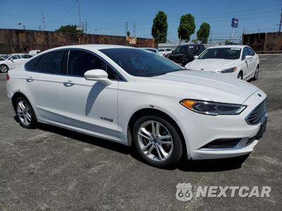 Czwarte zdjęcie samochodu z boku: 2018 FORD FUSION SE HYBRID VIN:3FA6P0LU0JR118674 - miniatura