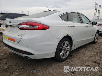Trzecie zdjęcie samochodu z tyłu: 2018 FORD FUSION SE HYBRID VIN:3FA6P0LU9JR172071 - miniatura