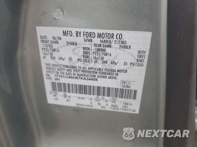 Zdjęcie 12 z 14 samochodu: 2007 FORD ESCAPE HEV VIN:1FMCU49H87KA34456 - miniatura