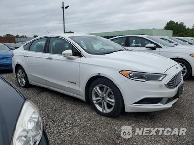 Czwarte zdjęcie samochodu z boku: 2018 FORD FUSION SE HYBRID VIN:3FA6P0LUXJR281929 - miniatura