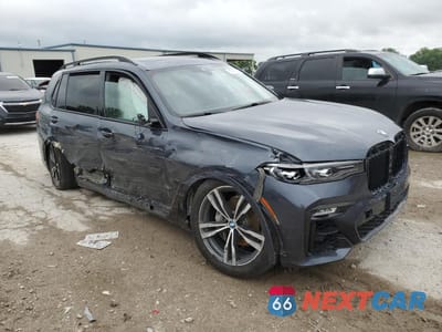 Czwarte zdjęcie samochodu z boku: 2020 BMW X7 XDRIVE40I VIN:5UXCW2C09L9D28604 - miniatura