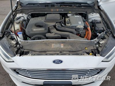 Zdjęcie 11 z 13 samochodu: 2018 FORD FUSION SE HYBRID VIN:3FA6P0LU8JR178475 - miniatura