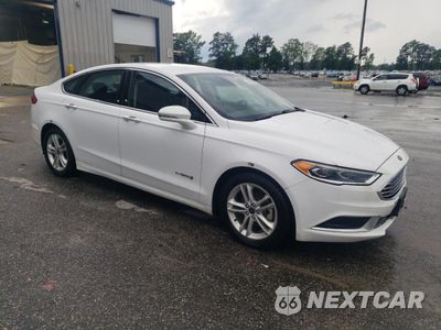 Czwarte zdjęcie samochodu z boku: 2018 FORD FUSION SE HYBRID VIN:3FA6P0LU8JR163488 - miniatura