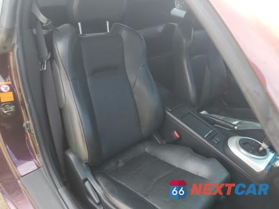 Zdjęcie 10 z 14 samochodu: 2006 NISSAN 350Z COUPE VIN:JN1AZ34E66M353414 - miniatura