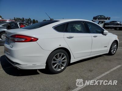 Trzecie zdjęcie samochodu z tyłu: 2017 FORD FUSION SE HYBRID VIN:3FA6P0LU3HR409759 - miniatura