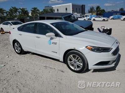 Czwarte zdjęcie samochodu z boku: 2018 FORD FUSION SE HYBRID VIN:3FA6P0LU5JR278713 - miniatura