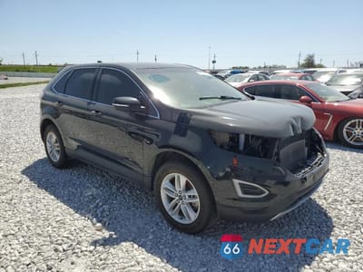Czwarte zdjęcie samochodu z boku: 2017 FORD EDGE SEL VIN:2FMPK4J89HBC04399 - miniatura