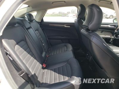 Zdjęcie 10 z 12 samochodu: 2017 FORD FUSION SE HYBRID VIN:3FA6P0LU3HR409258 - miniatura