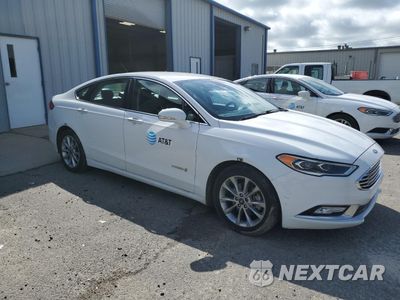 Czwarte zdjęcie samochodu z boku: 2017 FORD FUSION SE HYBRID VIN:3FA6P0LU7HR410154 - miniatura