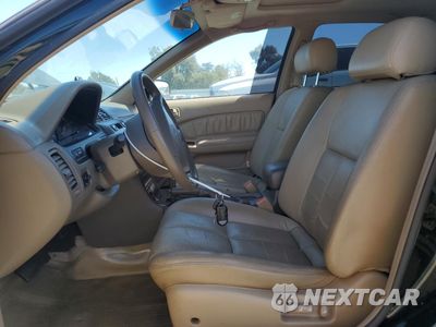 Zdjęcie 7 z 12 samochodu: 1999 NISSAN MAXIMA GLE VIN:JN1CA21D3XT809866 - miniatura