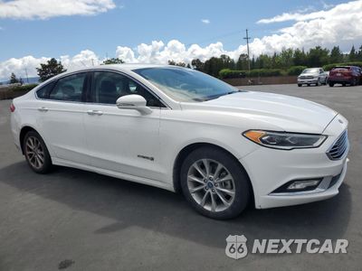 Czwarte zdjęcie samochodu z boku: 2017 FORD FUSION SE HYBRID VIN:3FA6P0LU1HR408965 - miniatura