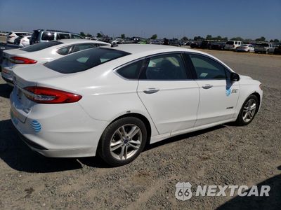 Trzecie zdjęcie samochodu z tyłu: 2018 FORD FUSION SE HYBRID VIN:3FA6P0LU7JR118705 - miniatura
