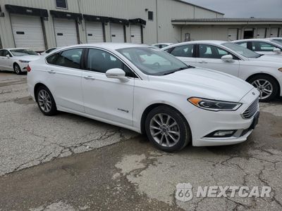 Czwarte zdjęcie samochodu z boku: 2017 FORD FUSION SE HYBRID VIN:3FA6P0LU7HR410137 - miniatura