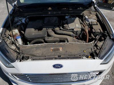 Zdjęcie 11 z 13 samochodu: 2017 FORD FUSION SE HYBRID VIN:3FA6P0LU0HR409153 - miniatura